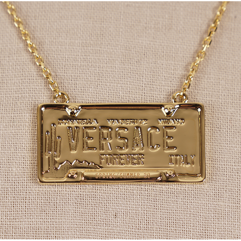 NEW $450 VERSACE Gold Tone Brass LICENSE PLATE LOGO CHARM Link